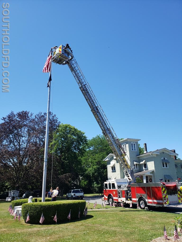 Wind-tangled flag unwound at American Legion Post 803 on July 4th, 2022 - 20220704_110238.jpg