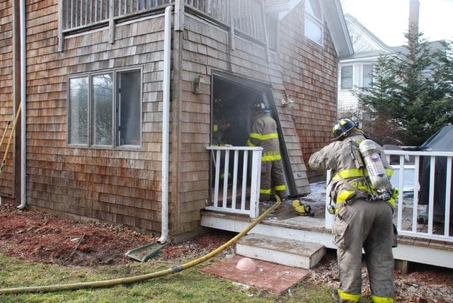 On Saturday afternoon, February 7, 2009, SFD was called to a Signal 13 - Gas Explosion & Fire on Town Haarbor Lane.  Two occupants of house were uninjured and made their own way to the outside.